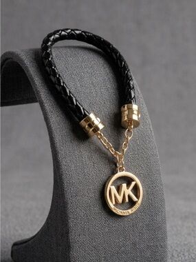 Michael Kors Black Braided Leather Bracelet with Gold MK Pendant
